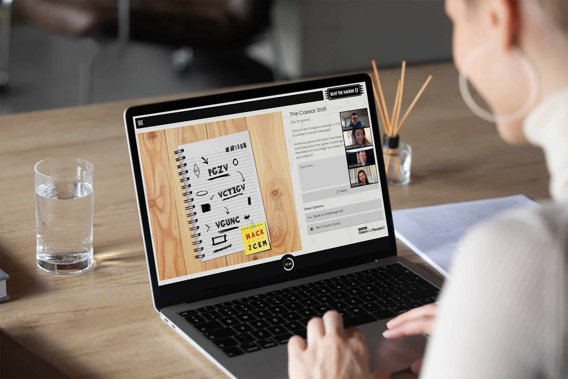 Woman playing a virtual escape room with her colleagues